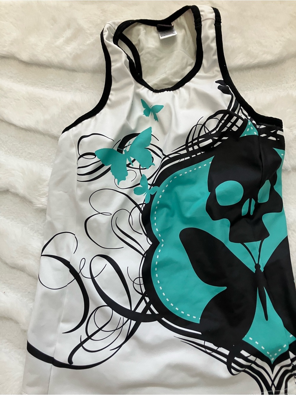 Betty Designs Tri top Women’s White & Teal Graphic Tank Top with Skull Design
